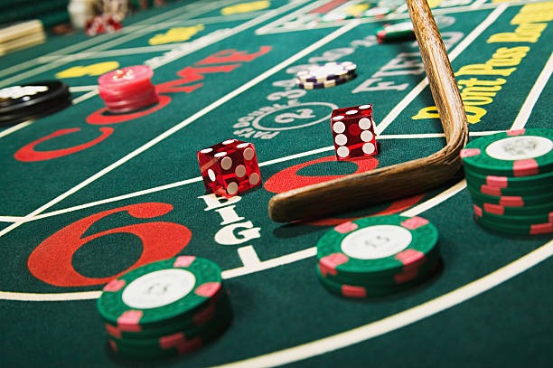 Live dealer studio with broadcast cameras and croupier at blackjack table